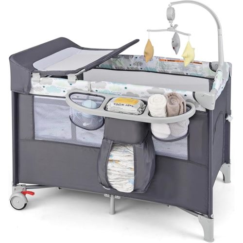 HONEY JOY Pack and Play with Bassinet, 5-in-1 Baby Bedside Sleeper w/Diaper Changing Table & Storage Bag, Toy Arch & Music Box, Detachable Side Rail, Portable Baby Play Yard w/Carry Bag(Coffee)