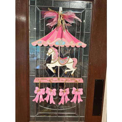 Carousel baby/hospital door hanger