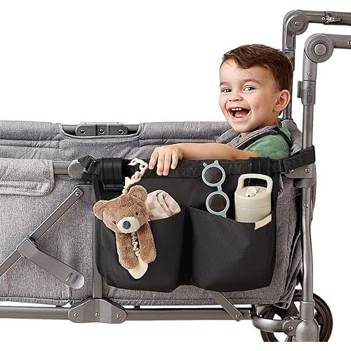 Itzy Ritzy Stroller & Wagon Organizer - Foldover Saddle-Style Storage Bag with 2 Deep Pockets, 1 Mesh Pocket & 4 Toy Loops - Hook & Loop Stroller Straps + Wagon Clips Included (Black)
