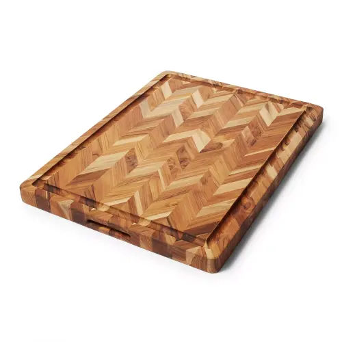 Teakhaus Reversible Cutting Board with Hand Grips & Juice Canal | Sur La Table