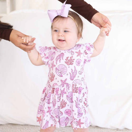 Sleeveless Twirl Bodysuit | Tiny Tides Pink