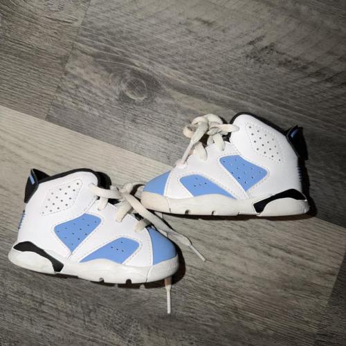 Baby Jordan 6 UNC. Size 4C. Basically brand new,...