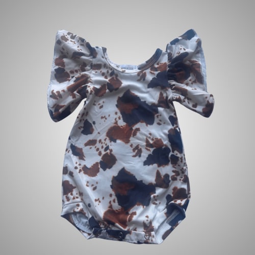 WESTERN SUNSET COW PRINT ROMPER