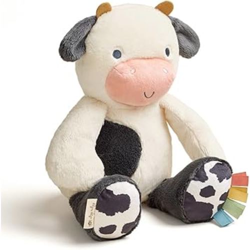 Itzy Ritzy Snuggles Plush Toy – Soft Stuffed Animal for Babies, Kids & Adults – Sensory Ribbons & Textured Fabrics for Tactile Play – Cozy & Cuddly Companion for Newborns & Up (Cow)