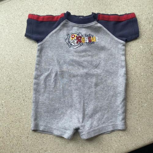 Grey and navy baby romper with red trim, Size: 3-6...
