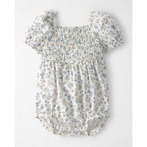 Baby Girl Smocked Romper Made with Organic Cotton in Spring Bloom - Little Planet | Carter's