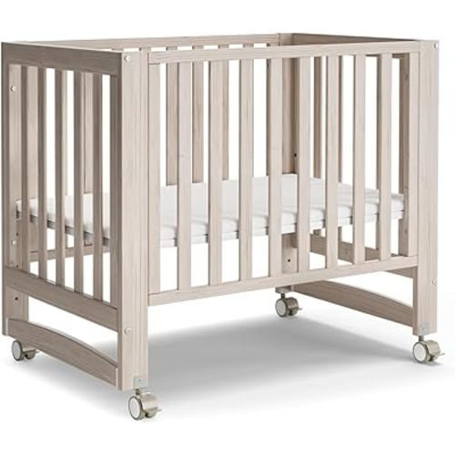 MAMAZING EvoNest Baby Crib, 6 in 1 Convertible Mini Crib with Wheels, 100% New Zealand Wood Growing Bed, 4 Adjustable Mattress Height, GREENGUARD Gold Certified, Wahsed Natural