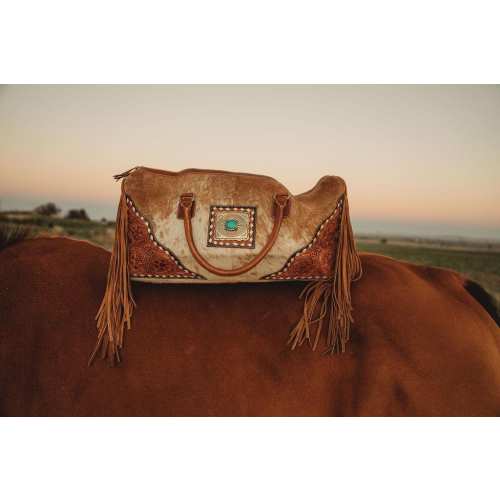 Concho cowhide duffel bag
