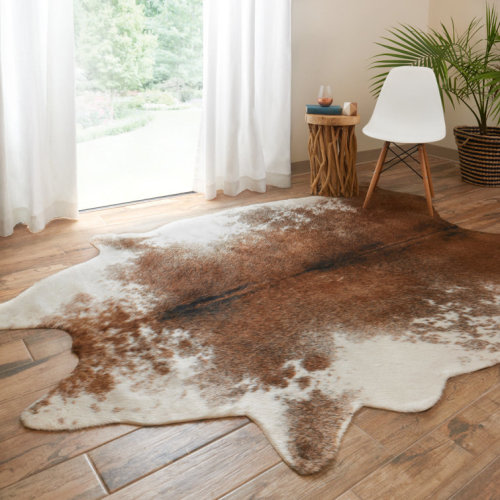 Isal Performance Hand Hooked Faux Cowhide Animal Print Indoor Rug