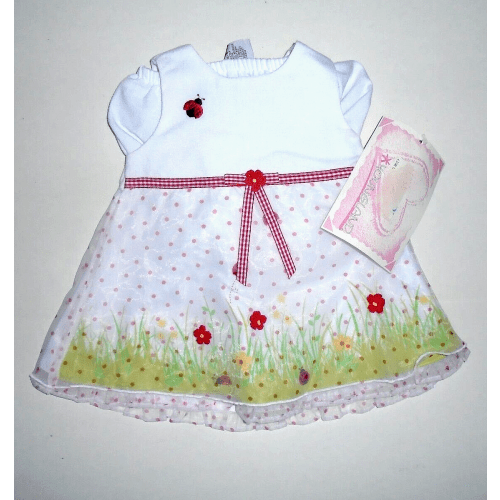YOUNGLAND GIRLS 2 PIECE DRESS SET IN A FLORAL AND DOT DESIGN 6-9 MONTHS