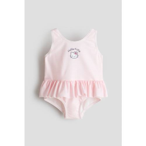 SWIMSUIT WITH FLOUNCES