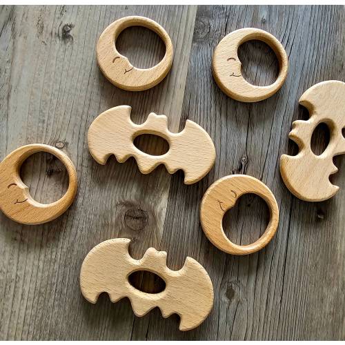 The occult wooden teethers with fastening strap (different designs to choose from)