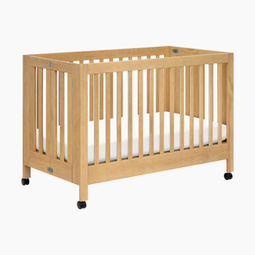 babyletto Maki Full-Size Portable Folding Crib with Toddler Bed Conversion Kit - Honey