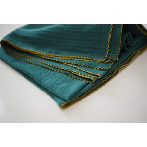 Forest green swaddle with mustard embroidery in organic cotton – Maudika Baby