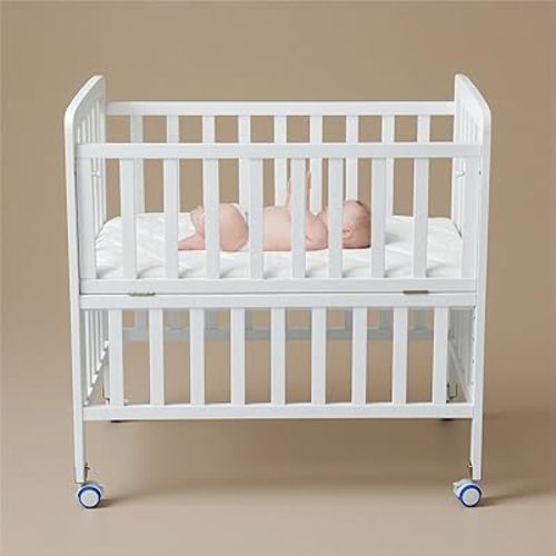 Flwrgirl Convertible Mini Baby Crib - Portable Bedside Bassinet with Mattress Included,3 Heights Baby Crib with Wheels for Small Room and Newborns 0-12 Months,White