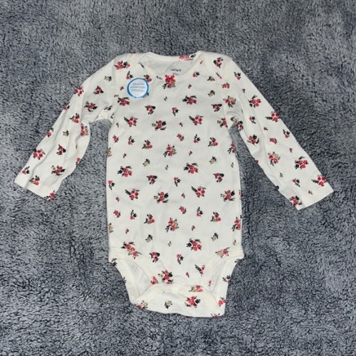 0-3 month Carters long sleeved onesie. Off white shirt w/red flowers