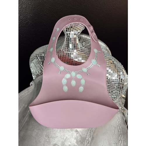 The Turquoise Squash Silicone Bib in Purple