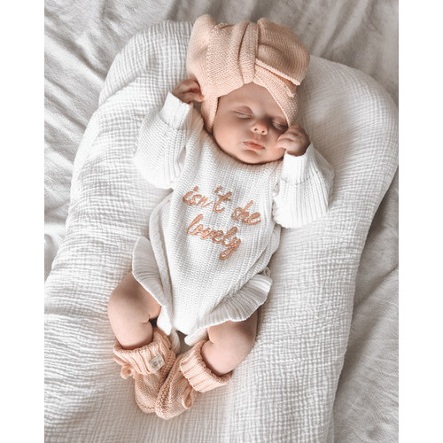 'Isn't she lovely' Baby knitted romper