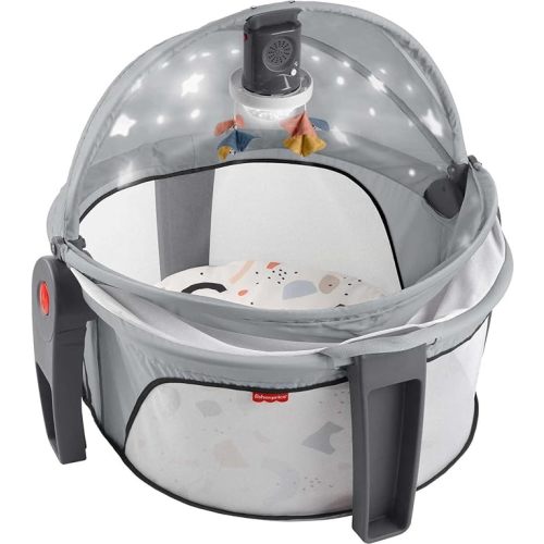 Fisher-Price Portable Baby Bassinet Deluxe On-The-Go Projection Dome, Travel Play Space for Newborns with Lights Music & Canopy, Paper Shapes - Gray