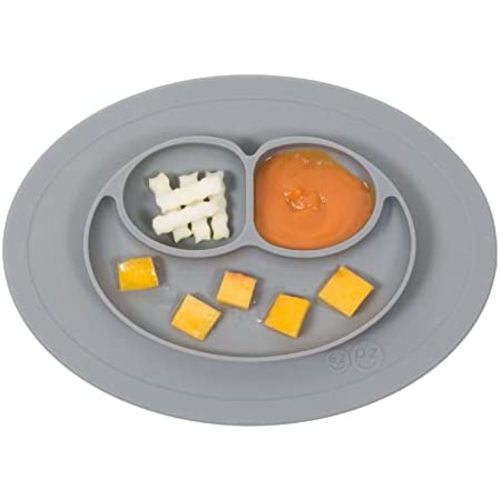 ez pz Mini Mat (Gray) - 100% Silicone Suction Plate with Built-in Placemat for Infants + Toddlers - First Foods + Self-Feeding - Comes with a Reusable Travel Bag
