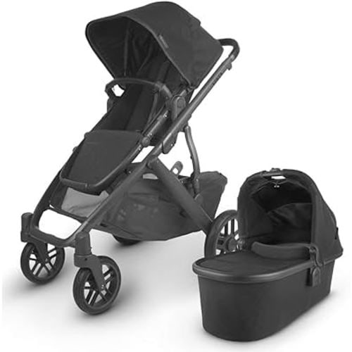 UPPAbaby Vista V2 Stroller / Convertible Single-To-Double System / Bassinet, Toddler Seat, Bug Shield, Rain Shield, and Storage Bag Included / Jake (Charcoal/Carbon Frame/Black Leather)
