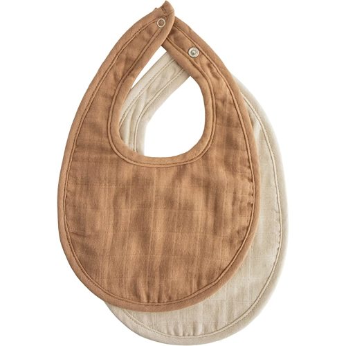 mushie Muslin Baby Bib | Soft Cotton for Infant Drips, Drools & Feedings | Adjustable Fit | 2 Pack (Tan/Fog)