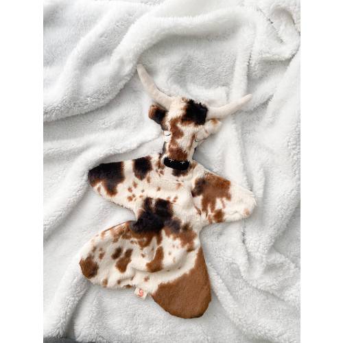 Tex the longhorn, lovie, stuffed animal, security blanket.