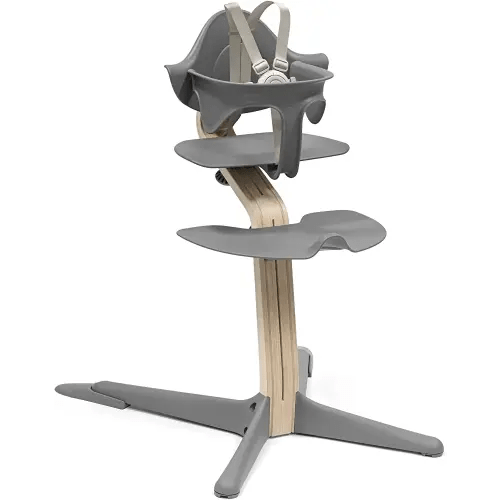 Stokke Nomi High Chair, Grey/Natural - Inspires Active Sitting - Tool-Free, Seamless Adjustability - Includes Baby Set with Removable Harness for Children 6-24 Months