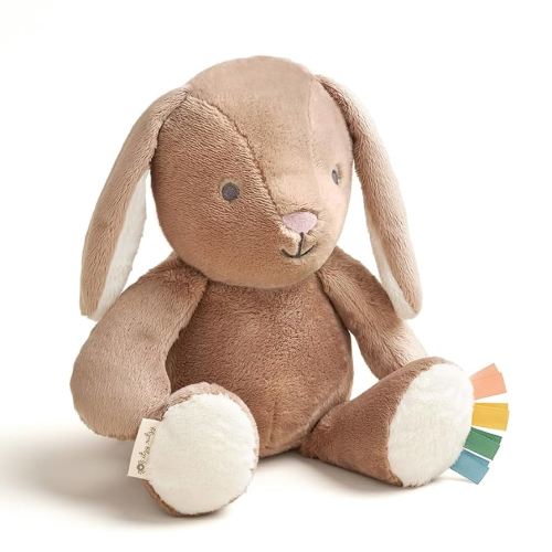 Itzy Ritzy Snuggles Plush Toy – Soft Stuffed Animal for Babies, Kids & Adults – Sensory Ribbons & Textured Fabrics for Tactile Play – Cozy & Cuddly Companion for Newborns & Up (Taupe Bunny)