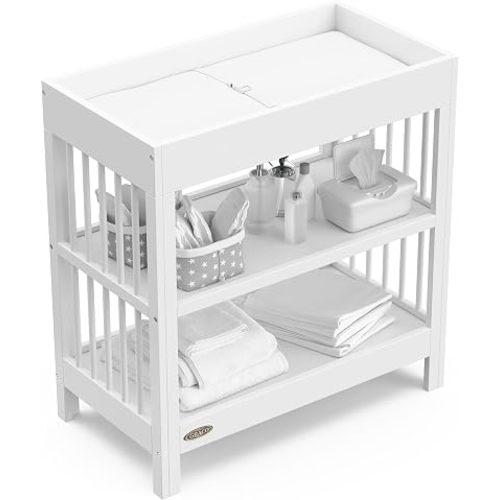 Graco Teddi Changing Table with Water-Resistant Changing Pad (White) - GREENGUARD Gold Certified, Includes Bonus Water-Resistant Changing Pad with Safety Strap, 2 Shelves, Easy-to-Match