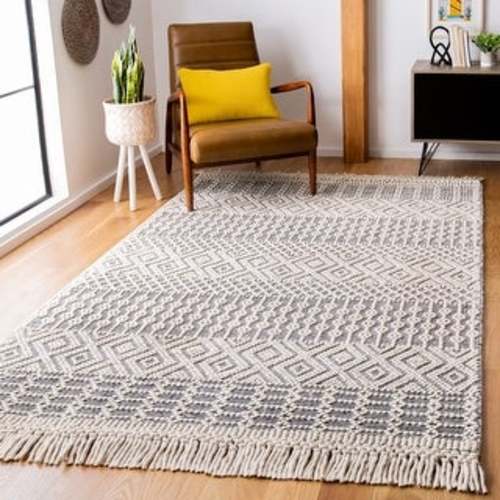 SAFAVIEH Handmade Natura Chiang Wool Fringe Rug