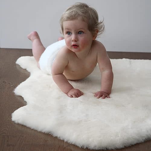 Premium Baby Sheepskin Rug Babycare Nursery Rug 100% Natural Lambskin Blanket Short-Shorn Wool Sleep Pad Medical Sheepskin Hospital Bed Mattress Topper (Ivory White, Single Pelt 2.5ft x 3.5ft)
