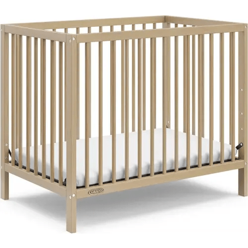 Graco Teddi 4-in-1 Convertible Mini Crib with Bonus Water-Resistant Mattress (Driftwood) – GREENGUARD Gold Certified, 2.75-Inch Mattress Included, Convenient Size, Easy 30-Minute Assembly