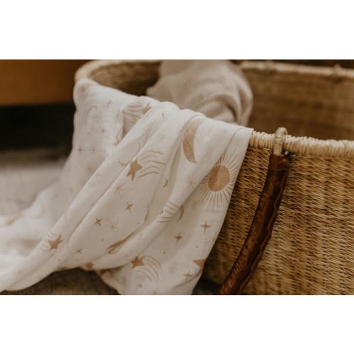Celestial organic cotton muslin baby swaddle | Sun and moon newborn receiving blanket