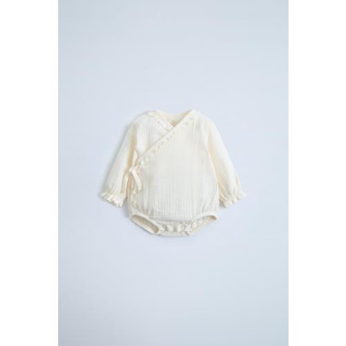 LITTLE RUFFLE MUSLIN WRAP BODYSUIT - Cream | ZARA United States