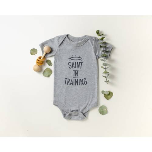 Saint In Training Baby Bodysuit