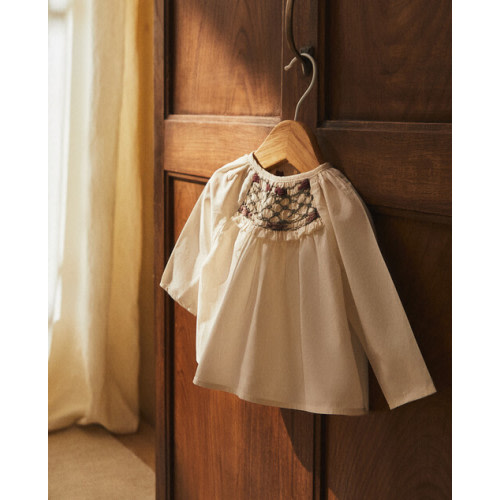 White blouse with embroidery