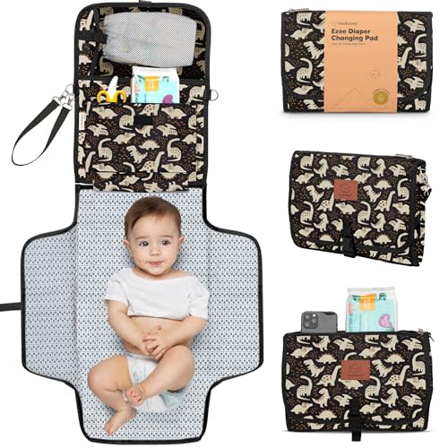 KeaBabies Portable Diaper Changing Pad - Large Waterproof Baby Changing Mat, Compact Travel Diaper Clutch, Functional Pockets Fit Newborn Essentials, Wipeable & Padded Baby Changer (Dino Ridge)