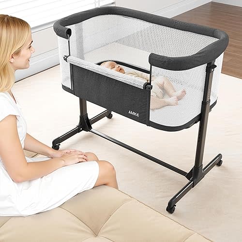 AMKE Baby Bassinet Bedside Sleeper with Adjustable Height & Breathable Mesh, Portable Bassinet with Wheels, Easy Fold Design - Newborn Crib with Drop Down Side for Infants up to 20 Lbs (Dark Grey)