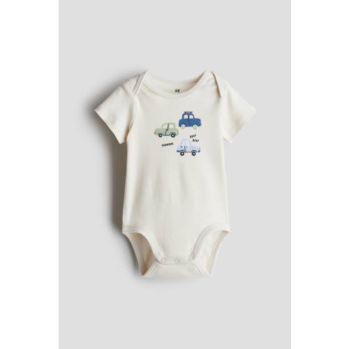 PRINTED BODYSUIT WITH LAP SHOULDERS