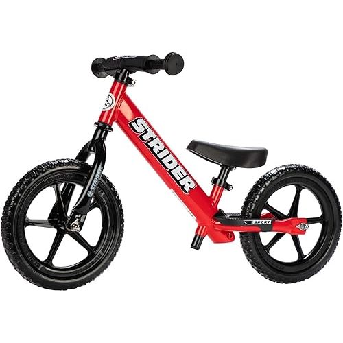 Strider 12” Sport Bike - No Pedal Balance Bicycle for Kids 1 to 4 Years - Includes Safety Pad, Padded Seat, Mini Grips & Flat-Free Tires - Tool-Free Assembly & Adjustments