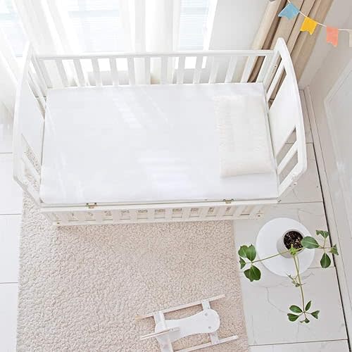 Flannel Crib Protector Pad，100％ Waterproof Mattress Protector Pad, One Size, 27" X 50" White