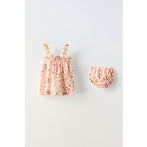 FLORAL DRESS WITH ELASTIC DETAILS