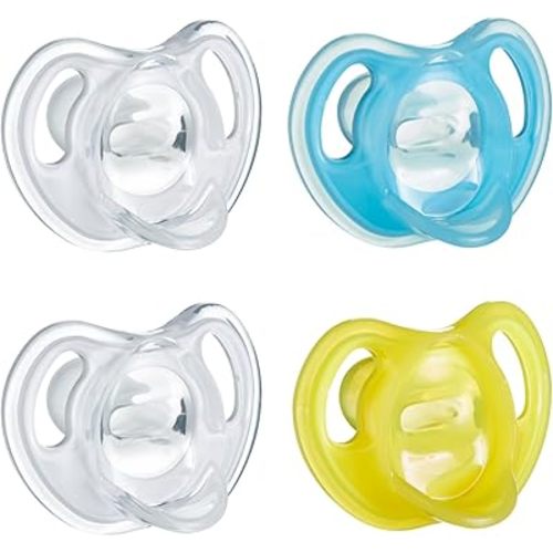 Tommee Tippee Ultra-Light Silicone Pacifier, 6-18 Months, Symmetrical One-Piece Design, BPA-Free Silicone Binkies, Clear/Blue/Yellow, Pack of 4