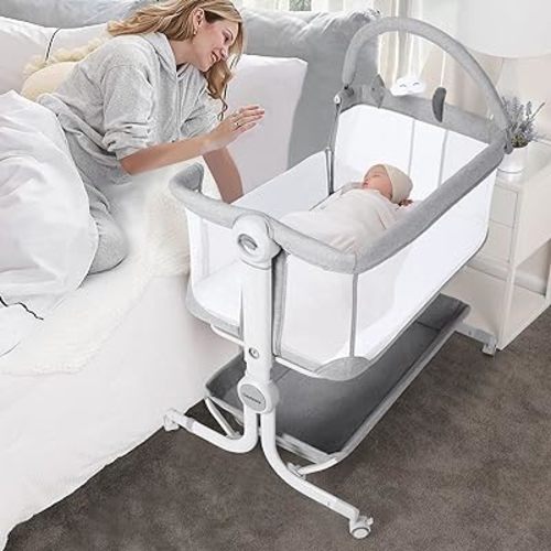 Cowiewie Baby Bassinet Bedside Sleeper with Storage Basket,Wheels and Toys, Easy Folding Portable Bassinet with Wheels Adjustable Height Portable Bassinets for Newborn
