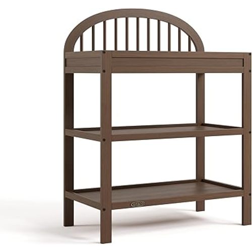 Graco Olivia Changing Table with Water-Resistant Changing Pad (Hazelnut) - GREENGUARD Gold Certified, Includes Bonus Water-Resistant Changing Pad with Safety Strap, 2 Open Shelves, Stylish Design
