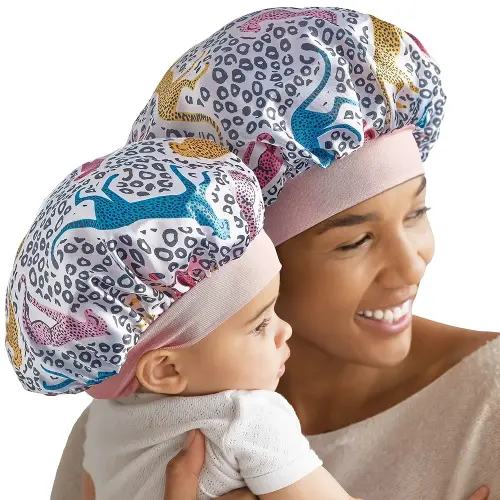 Red by Kiss 2-in-1 Mommy & Me Satin Bonnet Sleep Cap for Adult and Babies, Soft, Stretchy, and Safe, Protects Fragile Hair from Frizz & Breakage, Friction Bald Spots (Cheetah, 6-18M)