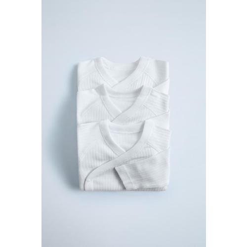 THREE-PACK OF SURPLICE WRAP BODYSUITS