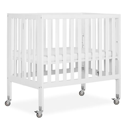 Dream On Me Jett Mini Folding Baby Crib in White, GreenGuard Gold & JPMA, Lightweight & Portable, Patented Flat Folding System for Small Spaces & Travel, 1.5” Mattress Pad, 3 Heights, Safe Wheels