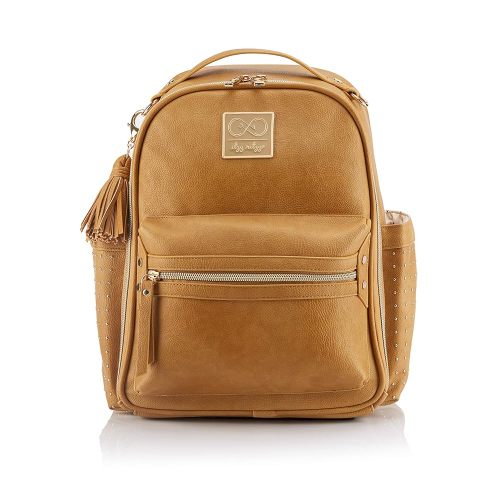 Itzy Ritzy Chelsea + Cole Mini Diaper Bag Backpack - Studded Mini Backpack with Changing Pad, 8 Pockets, Rubber Feet & Tassel - Caramel with Sweetheart Print Interior and Gold Hardware